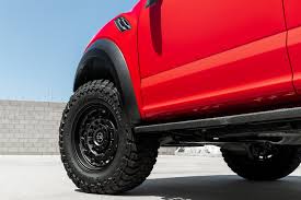 Black And Red Wheels For F150 Bold Red F 150 Raptor Looking Mean On Black Rhino Wheels Black Rhino Wheels Raptor Rhino
