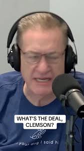 Why does Clemson still take buses around the stadium before every home game?