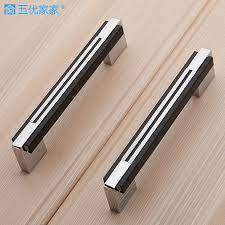 Cabinet handles are the finishing touch to any kitchen remodel.keep reading for information on how to choose cabinet handles that will help give your kitchen the look you want. Solid High Grade Ambry Drawer Handles Furniture Knob Wardrobe Door Handle Contemporary Contracted Kitchen Cabinet Black Pulls Black Pull Drawer Handleswardrobe Door Handles Aliexpress