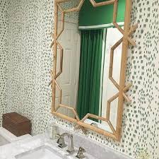 Green backsplash, green vanity, green painted walls, green tile, green accents, and green decor accessories. Tan And Green Bathroom Ideas Design Ideas