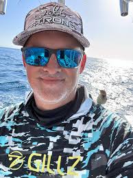 Fishing trip encounter with a tired bird offshore