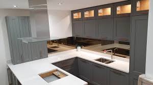 Two tone kitchen cabinets are a style that is growing in popularity and can increase visual interest in a space, and let you bring in your own unique personality to your design. Ex Display Kuchen Bespoke Shaker Carrick Painted Oak Grey Kitchen Used Kitchen Hub