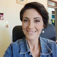 Can a parent collect a child's ID card?