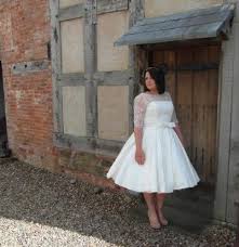 Reformation gatsby dress, $488, reformation.com simple can still mean stunning and this draped gown with intricate floral cutouts is the perfect example of that. Plus Size Vintage Wedding Dresses Archives Blurmark