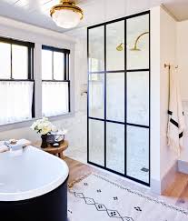 Typical workarounds a less than private bathroom window include curtains or shades but using either of. How To Remove Hard Water Stains From A Glass Shower Martha Stewart