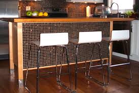 It's not a large room, but it has one empty ~6.5' wall, so we figured we could get a moveable island. Kathy S Remodeling Blog Backsplash
