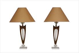 Some dents in the lamp shade but overall good condition. Pair Of Mid Century Modern Wood Marble Table Lamps