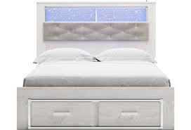 50 inches high x 63 inches wide x 79 inches long. Signature Design By Ashley Altyra Queen Storage Bed With Upholstered Bookcase Headboard Suburban Furniture Upholstered Beds