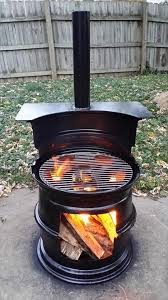 Barrel Repurposed Into Fire Pit Bbq 1001 Gardens Fire Pit Bbq Diy Bbq Diy Fire Pit