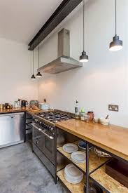 Industrial style kitchens can typically be found in old buildings and lofts, but some homeowner's love the a home's foundation can serve as the basis for industrial style, which exposed beams, brick. Industrial Kitchen Ideas 20 Simple Easy Diy Decors On A Budget Famedecor Com