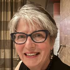 Emily Ratajkowski, at her ninth Met Gala, wore a long-sleeve backless gown  from a 2001 Atelier Versace couture collection. “It feels really natural