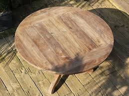 The 2 inch tops are made from reclaimed barn floor boards, also called threshing floor boards. Lowry 135cm Reclaimed Teak Round Garden Patio Dining Table