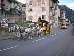 historic stagecoach at the gotthard pass in switzerland here the starting point in airolo street view switzerland scenes