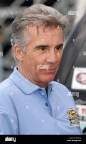 John Walsh of the television show, "America's Most Wanted" prior to the  start of the NASCAR NEXTEL All-Star Challenge at Lowe's Motor Speedway in  Charlotte, NC
