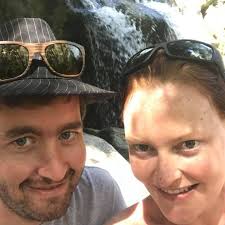 How to set up a charging cable in a car port to avoid tripping hazards and  allow for easy access?