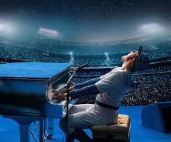 Elton john's outfits through the years. Elton John S Real Life Costume Designers Talk Rocketman