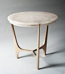 This side table adopts a classic silhouette, providing a fresh perspective thanks to distinctive material choices. Demuro Das Athena Side Table