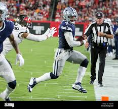 USA. 09th Sep, 2021. Dallas Cowboys quarterback Dak Prescott (4) runs out  of bounds during the first half against the Tampa Bay Buccaneers at Raymond  James Stadium, Thursday, Sept. 9, 2021, in