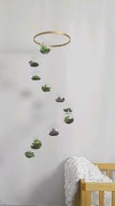 This Hanging Terrarium Mobile Is A Hand Crafted Work Of Art It Looks Lovely In Any Living Space And Is Succulents Decor Hanging Terrarium House Plants Decor