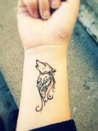 Pin By Emily Krejci On Tattoo Ideas Small Tribal Tattoos Tribal Wolf Tattoo Tattoos