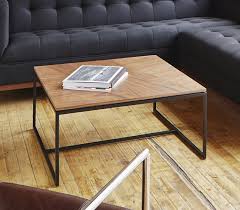 The table itself has a bit more blue and gray tones than expected but it's still beautiful. Gus Modern Tobias Square Coffee Table