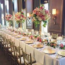 Wedding reception flowers for long tables. Posh Floral Designs Long Table Design For A Wedding Reception Reception Table Decorations Wedding Table Designs Long Table Wedding