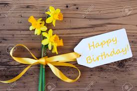 Maybe you would like to learn more about one of these? Label With English Text Happy Birthday Yellow Spring Narcissus Or Daffodil With Ribbon Aged Rustic Wodden Background Greeting Card For Spring Season Stock Photo Picture And Royalty Free Image Image 67201326