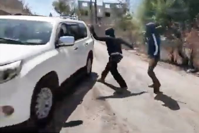 Masked Israeli settlers beat Palestinian woman and NBC News crew in West Bank; Netanyahu condemns 'criminal acts' as UN reports 76 Palestinians killed this year
