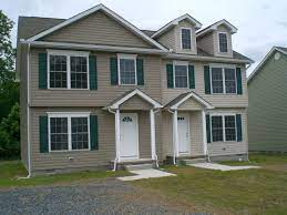 Tan house with green shutters. Custom Homes Delaware Exterior 54e2e Custom Home Builders Delaware Hunter Creek Homes
