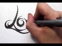 As specified by the word itself, the tribal tattoo indicates the category of tattoos that are based on traditional graphics of indigenous peoples and tribes all over the world. Word Tattoos Love Design In Cool Tribal Writing Youtube