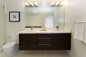 Another lighting idea for a bathroom vanity decoration is wall scones with a trumpet shape. Double Vanity Light Houzz