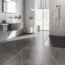 Get a change from the typical marble floor by using small tiles rather than large squares. National Tile Bathroom Wall Floor Tiles