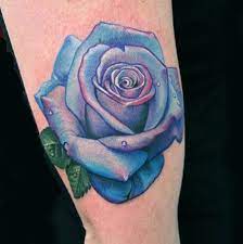 A blue lotus flower tattoo actually represents wisdom and knowledge so we can say she has her own specific reasons for doing that. Realistic Blue Rose Tattoo Blue Rose Tattoos Purple Rose Tattoos Pink Rose Tattoos