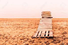 sandy lake shore half sinked