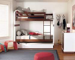 A bunk bed is a type of bed in which one bed frame is stacked on top of another, allowing two or more beds to occupy the floor space usually required by just one. 50 Modern Bunk Bed Design Ideas For Small Bedrooms