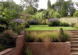 Beds Slopes And Step Ideas Ideal For A Steep Or Terraced Garden Sloped Garden Brick Garden Garden Design