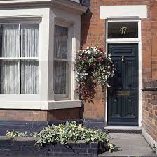 Hanging basket next to front door. Hanging Basket Beside Black Front Door Victorian Front Doors Victorian Terrace House Front Door