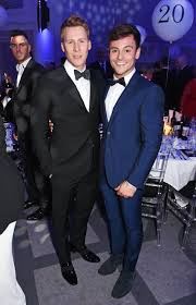 Tom daley, 26, is currently at his central london flat with his screenwriter husband dustin lance black, 45, and their toddler son robbie, along with tom's mother, amid the ongoing pandemic. Tom Daley And Dustin Lance Black At Lgbt Awards May 2017 Popsugar Celebrity