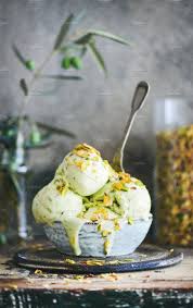 This pistachio ice cream recipe produces extremely smooth and creamy ice cream with an intense roasted pistachio flavour. Bowl Of Pistachio Ice Cream On Pistachio Ice Cream Ice Cream Photography Sorbet Ice Cream