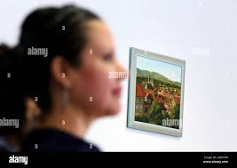 Halberstadt, Germany. 19th Sep, 2019. The Mexican doctor Karina Anabel  Alonso Vera (paediatrics) sits in the employment agency in front of a  painting with a city view. With the help of the