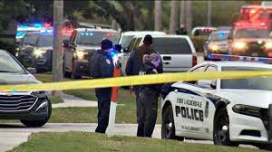 Law enforcement officers block an area where a shooting killed two fbi agents while serving an arrest warrant on feb. 2 Fbi Agents Killed 3 Hurt In Shooting While Serving Warrant In Florida Officials Abc News
