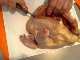 Place the chicken on the grill. Cutting A Whole Chicken In Half Youtube