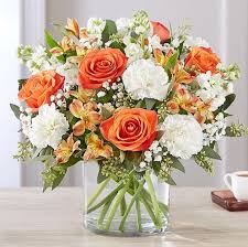 A bouquet of roses and daffodils is decorated with needles. Best Mother S Day Flower Delivery Services Beautiful Bouquets To Send On Mother S Day