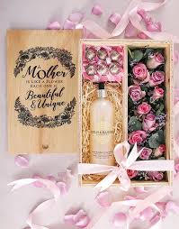 Mother's day gift box flowers. Flowers Box Of Roses Surprise This Mother S Day Gift Comes With A Bath And Body Product Chocolates Wine Gift Box Ideas Mother S Day Gift Baskets Wine Gifts