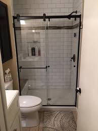 Small bathroom remodel ideas on a budget home depot. Delta Portman 48 In X 71 In Semi Frameless Contemporary Sliding Shower Door In Bronze With Full Bathroom Remodel Small Bathroom Bathrooms Remodel