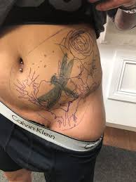The tummy tuck scar tattoo pictures. A Tummy Tuck Scar Dragon Fly Cover Up Ink Iron Tattoo Facebook