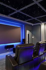 The tiered seating in this home theater, ensures unobstructed visibility from any seat and the wall to wall carpet provides additional sound absorption. Ideas On How To Make The Most Of Your Home Media Room Home Theater Rooms Home Cinema Room Media Room Ideas Theatres