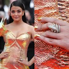This one hit me hard. Aishwarya Rai Bachchan To Taylor Swift 6 Times Celebrities Wore Serpent Accessories To Make A Bold Statement Pinkvilla