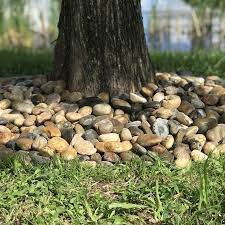 Rain Forest 30 Lb Brown Decorative Rock Lowes Com In 2021 River Rock Landscaping Stone Landscaping Landscaping With Rocks