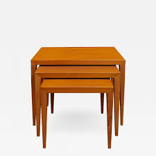 Casateak has a name for delivering these teak nesting coffee tables in natural finish are beautifully crafted, industrial look and well designed. Danish Set Of 3 Teak Nesting Tables 1950s